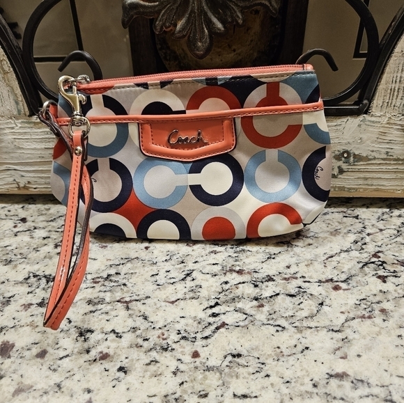 Coach Handbags - COACH Multicolor Op Art Wristlet with Coral Trim